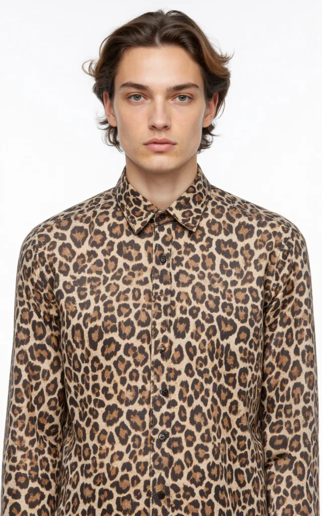 A French model wearing a Leopard print pattern   printed shirt, against a white background, in a front   facing bust portrait